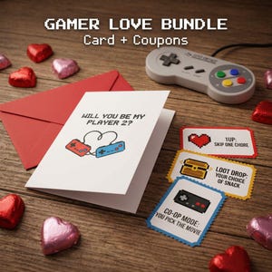 May include: A Gamer Love Bundle featuring a card with the text "Will you be my Player 2?" and coupons. The coupons include "1UP: Skip one chore", "Loot Drop: Your choice of snack", and "Co-op Mode: You pick the movie". A retro game controller and heart-shaped candies are also present.