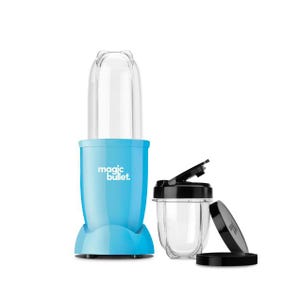 May include: A light blue Magic Bullet blender with a clear blending cup and a separate clear cup with a black lid. The blender base has the words "magic bullet" printed on it.