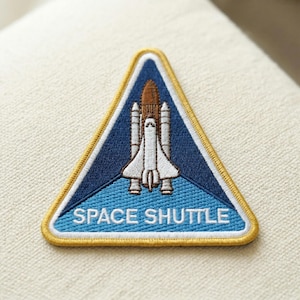 May include: A rustic wooden sign with the text "Welcome to our home" in white lettering. The sign features a distressed finish and a simple, inviting design, perfect for entryway decor.