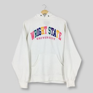 May include: White hooded sweatshirt with a front pocket and the words "WRIGHT STATE UNIVERSITY" in colourful letters across the chest. The sweatshirt is hanging on a wooden hanger.