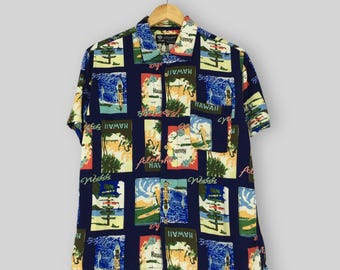 Camisa hawaiana vintage de los 90 Roushatte Aloha Tropical Rayon, talla L, con estampado abstracto de postal de playa hawaiana, ideal para fiestas en la playa y surf. Con botones. Talla L.