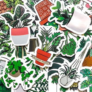 May include: A selection of plant-themed stickers, including images of potted plants, hanging plants, and botanical illustrations. Some stickers feature text like "Plant Mom" and "What You Go Through". The stickers are in green, white, red, and brown.