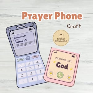 May include: A paper craft set featuring a light blue flip phone with a screen displaying Joshua 1:9 and a keypad with buttons labelled Amen, Pray, and numbers. Next to it is a pink closed phone graphic with the text Incoming Call God.
