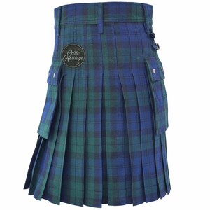 May include: A green and blue plaid kilt with pleats and pockets. The kilt has a buckle closure and a "Celtic Heritage" patch. The fabric is a traditional tartan pattern.