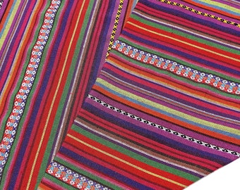 May include: Multicolored striped fabric with a diagonal pattern. The fabric has a variety of colors, including red, green, blue, purple, and yellow. The fabric is woven with a variety of textures, including smooth, rough, and textured.