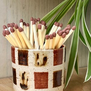 Handmade ceramic checkered matchstick holders with strikers
