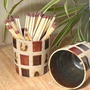 Handmade ceramic checkered matchstick holders with strikers