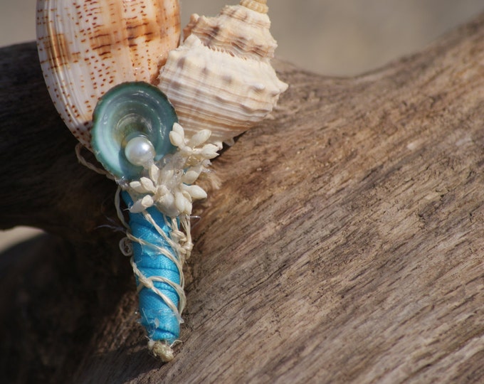 Malibu Blue/ Teal boutonnieres, seaside, beach wedding