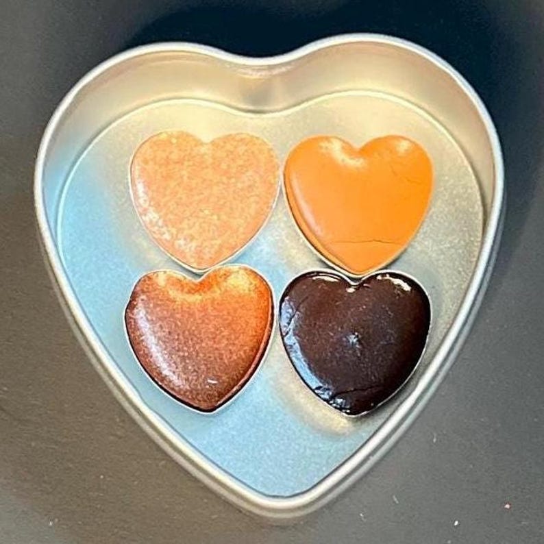 May include: A rustic wooden sign with the text "Welcome to our home" in white lettering. The sign features a distressed finish and a simple, inviting design, perfect for entryway decor.