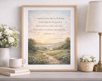 May include: Framed art print featuring a landscape scene with a path leading towards a sunset. The print includes the text "And we know that in all things God works for the good of those who love him, who have been called according to his purpose, ROMANS 8:28."
