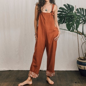 Rust Raw Cotton Dungarees: Adjustable Woven Overalls