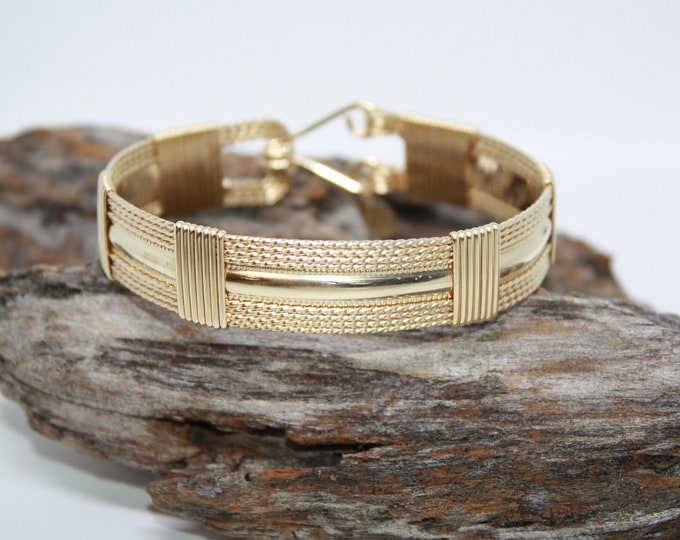 Elizabeth: Gold bracelet, Silver Bracelet