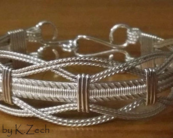 Filigree Contessa: Sterling and Argentium Silver wire wrapped wire bracelet.