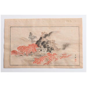May include: Antique Japanese woodblock print depicting a landscape with a small building, bridge, and vibrant red foliage. The artwork features a muted color palette with soft, earthy tones and a touch of red. The print is on aged paper.