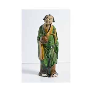 Antique 1800s Chinese Shiwan figure holding pot. Kintsugi repaired.