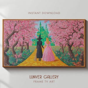 Puede incluir: Una impresión de arte digital enmarcada representa a dos figuras caminando por un camino de ladrillos amarillos hacia un castillo verde. La escena está enmarcada por árboles de flores rosas. Las palabras "INSTANT DOWNLOAD" y "LUNVER GALLERY FRAME TV ART" son visibles.