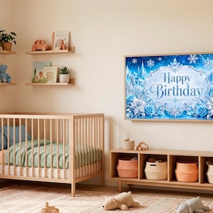 May include: A nursery with a wooden crib, shelves with toys, and a TV displaying a "Happy Birthday" message. The room has a neutral color scheme with a rug and various decorative items.