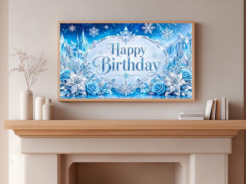 May include: A framed wall art piece with a winter theme. The artwork features a blue and white design with the words "Happy Birthday" in elegant script. Snowflakes, roses, and a castle are also depicted.