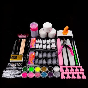 May include: A complete nail art kit with various tools and supplies. Includes white nail tips, pink nail files, clippers, brushes, glitter, and toe separators. Jars of white powder and a pink and clear liquid container are also present.