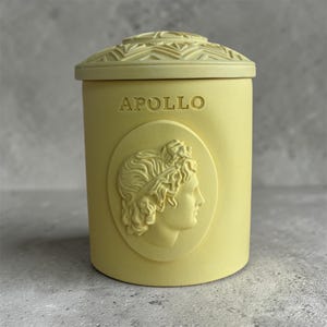 Vela de soja perfumada Apollo / Tarro de resina decorativo con motivos de la mitología griega (Melocotón, Rosa, Madera de Teca)