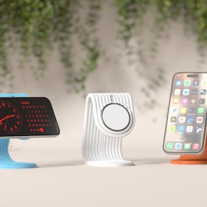 May include: Three modern tech stands in blue, white, and orange. The blue stand holds a digital clock and calendar. The white stand is for a smartwatch. The orange stand holds a smartphone. All stands have a curved design.