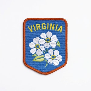 May include: A set of three ceramic mugs with a speckled, matte finish. The mugs are in shades of cream, light gray, and dark gray. Each mug has a simple, minimalist design and a rounded handle.