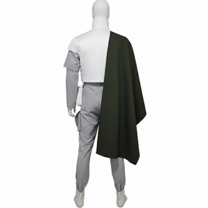 May include: A white ceramic mug with a black handle and the text "But First, Coffee" in a handwritten style. The mug is on a white surface. The mug is 4 inches tall.