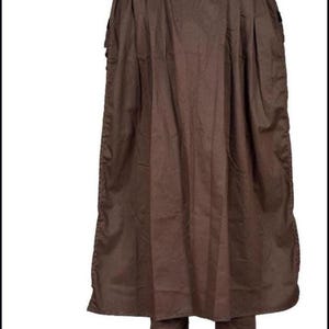 May include: A brown outfit consisting of a long cape and matching pants. The cape has a high collar and extends to the knees. The pants are straight-legged. The outfit is made of a solid, matte fabric.
