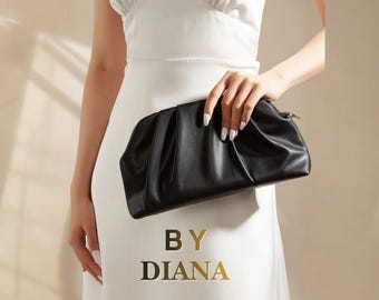 Pochette in pelle nera, borsa da sera minimalista ed elegante.