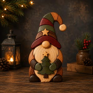 May include: A decorative wooden gnome figurine featuring a tall, multi-colored hat in shades of green and deep red with a small star accent. The gnome has a light-colored wooden beard, a round nose, and holds a small green wooden Christmas tree.