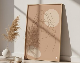 Op de afbeelding: Een ingelijste kunstdruk met een minimalistische lijntekening van een vrouwengezicht en bovenlichaam. Het kunstwerk heeft een neutraal kleurenpalet met een beige achtergrond en een lichtbruine lijst. De print leunt tegen een witte muur.