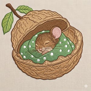 May include: An embroidery design featuring a brown mouse sleeping inside a textured brown walnut shell. The mouse is wrapped in a green blanket with white polka dots. A brown stem with two green leaves is attached to the top of the walnut shell.