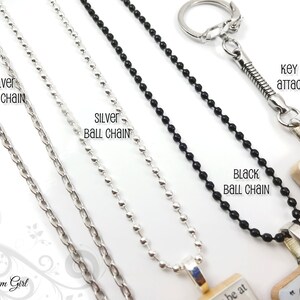 May include: Close-up of various necklace chains and a keychain attachment. The chains include silver link chains, silver ball chains, and black ball chains. The text "SILVER LINK CHAIN", "SILVER BALL CHAIN", "BLACK BALL CHAIN", and "KEY CHAIN ATTACHMENT" are visible.