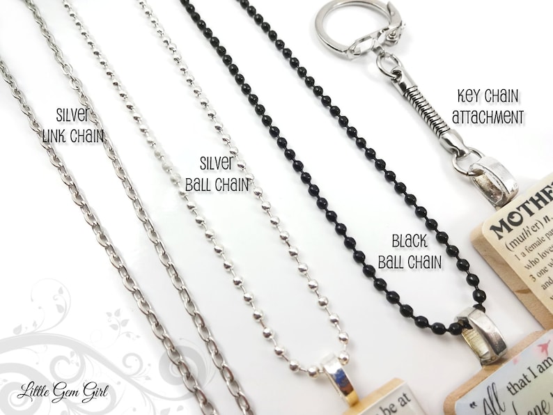 May include: Close-up of various necklace chains and a keychain attachment. The chains include silver link chains, silver ball chains, and black ball chains. The text "SILVER LINK CHAIN", "SILVER BALL CHAIN", "BLACK BALL CHAIN", and "KEY CHAIN ATTACHMENT" are visible.