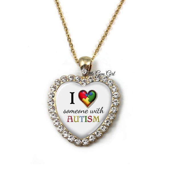 Amo a alguien con collar de corazón de autismo en acabado plateado o dorado - Joyería de apoyo y concientización sobre el autismo - Colgante de cristal de diamantes de imitación
