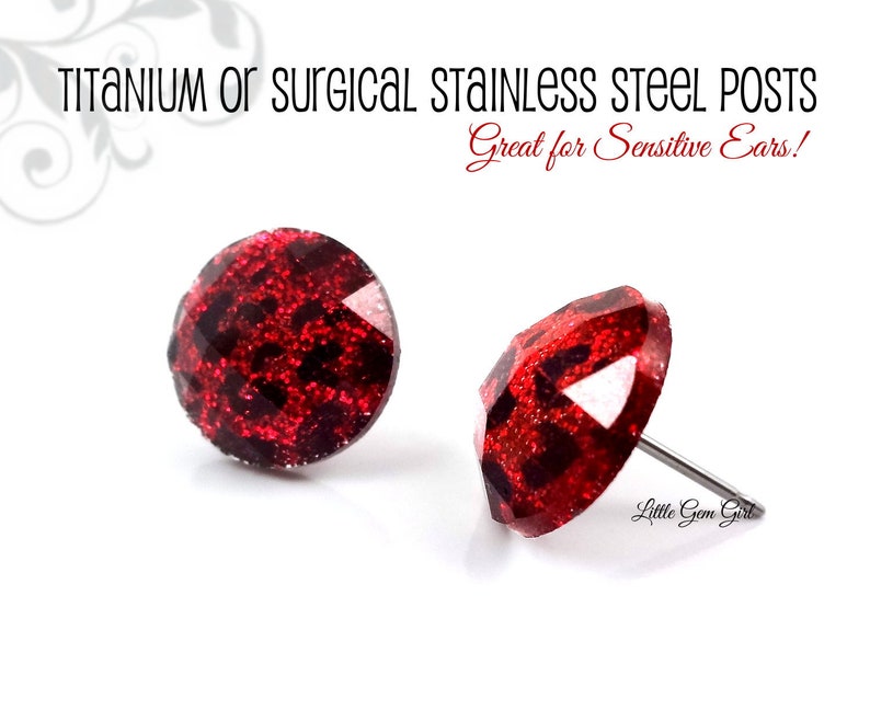 May include: A pair of red glitter stud earrings with titanium or surgical stainless steel posts.  Great for sensitive ears!  Little Gem Girl.