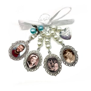 May include: A silver charm bracelet featuring a heart charm inscribed with the words "You are always in my heart!" and four oval photo charms. The photo charms display black and white photographs of individuals. The bracelet is adorned with white pearls and blue beads.