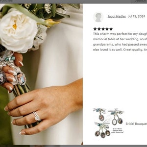 May include: A bridal bouquet charm with three photo frames, each containing a different picture. The charm is attached to a bouquet of white flowers. The text "Bridal Bouquet Charm 1 to 3 Picture and Handwriti..." is visible below the charm.
