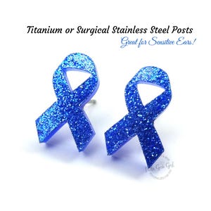 May include: A pair of blue glitter ribbon earrings with titanium or surgical stainless steel posts.  Great for sensitive ears!