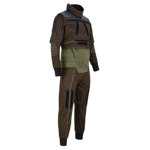 May include: A brown and olive green jumpsuit with a high collar and geometric paneling. The outfit features black accents, a short-sleeved top, and fitted pants. The design includes a textured pattern and is likely a costume or specialized garment.