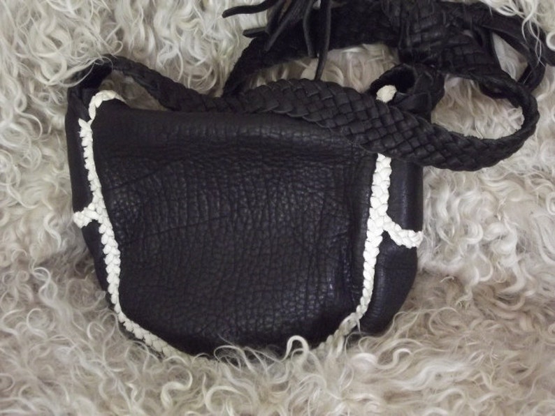 The Orca is purse is made from buffalo skin and has soft Etsy