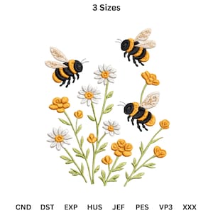 以下が含まれることがあります： 3匹のミツバチと、デイジーと黄色の花のフラワーアレンジメントが特徴の刺繍デザイン。ミツバチは黒と黄色で、詳細な羽があります。「3 Sizes」の文字が上部にあります。