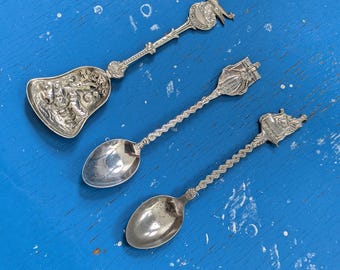 Vintage teaspoons, Unique Sugar scoop with airplane, milkmaid and Old Dutch man and woman with sleigh