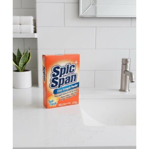 May include: An orange box of Spic and Span Extra Strength Powder cleaner, with the words "Spic and Span" in a blue and white design. The box is labeled "Sun Fresh" and sits on a white countertop.