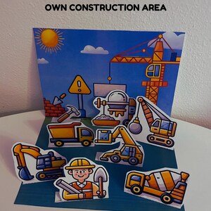 May include: A set of 14 construction-themed stickers with a blue background. The stickers include a crane, excavator, dump truck, and a construction worker. Text on the image reads: "14 DIFFERENT STICKERS - USE YOUR IMAGINATION AND CREATE YOUR OWN CONSTRUCTION AREA."