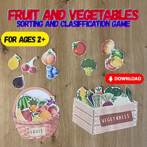 May include: A colorful educational game featuring fruit and vegetable cutouts, a fruit basket, and a wooden crate labeled "Vegetables." The text "Fruit and Vegetables Sorting and Classification Game" and "For Ages 2+" are displayed.