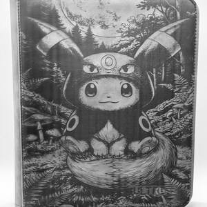 May include: A gray tablet case featuring a detailed illustration of a cartoon creature in a forest setting under a full moon. The artwork is in a grayscale color scheme, with intricate details of trees, ferns, and mushrooms.