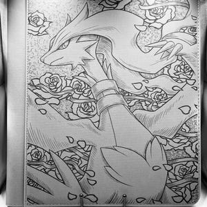 May include: A monochrome notebook cover with a detailed illustration of a dragon-like creature surrounded by roses. The artwork is in a manga style, with fine lines and shading. The cover has a light grey border and a metal clasp.