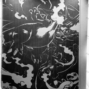 May include: A black and white illustrated card binder featuring a dynamic design of several fantasy creatures. The cover art includes a large, detailed illustration of a dragon-like creature with flames and other smaller creatures. The text "Poke B" is visible in the lower left corner.