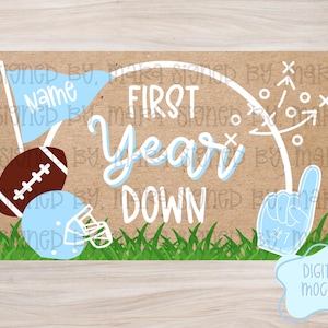May include: A football-themed graphic with the text "FIRST Year DOWN" in white and light blue. Includes a football, helmet, and a foam finger. The background is a kraft paper texture with green grass at the bottom.